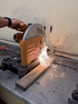 RIDGID cut-off saw shaping a shaft
